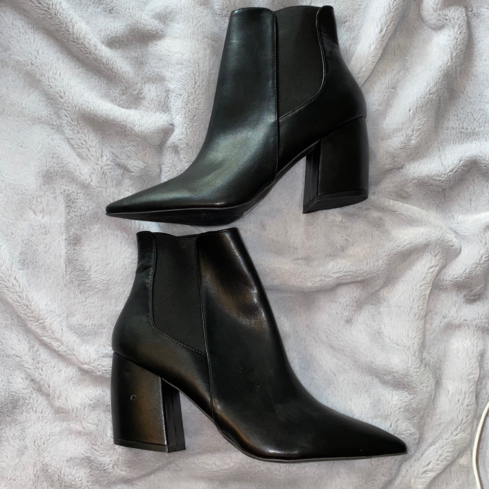 Black pointed toe elastic booties